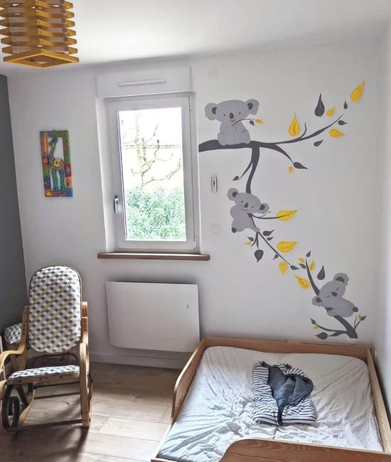 Fresque de koalas peinte dans une chambre